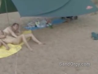 Crazy public beach swinger fucking wow this is nuts
