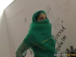 Nadia Ali Having Fun With Black penis In A Gloryhole